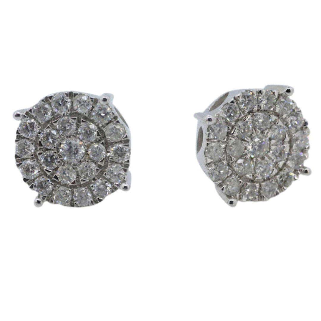 Pair of silver earrings with gemstones on a white background