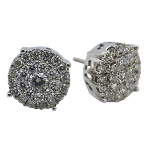 Pair of silver earrings with gemstones on a white background