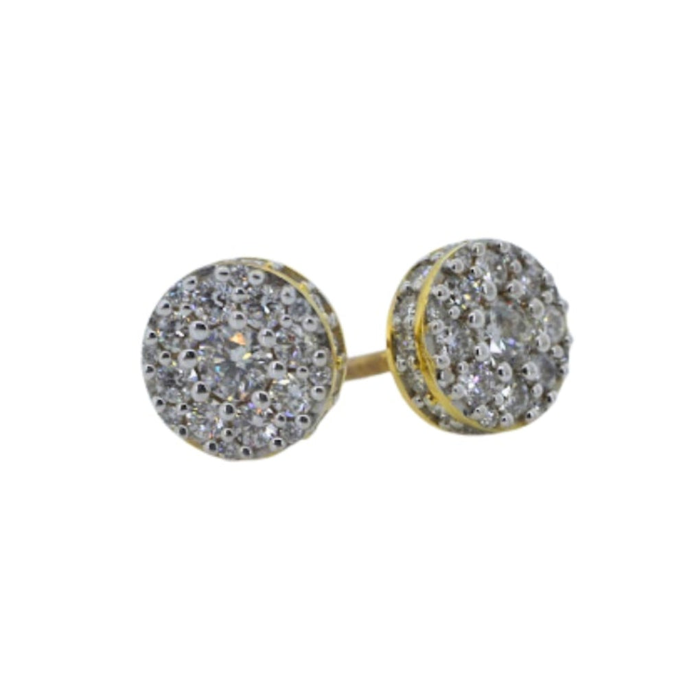 Pair of round earrings with glittery surface on a white background