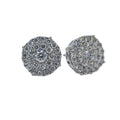 Pair of round silver earrings on a white background