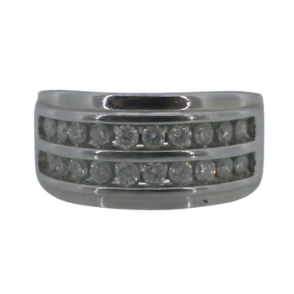 Stack of silver rings with embedded stones on a white background