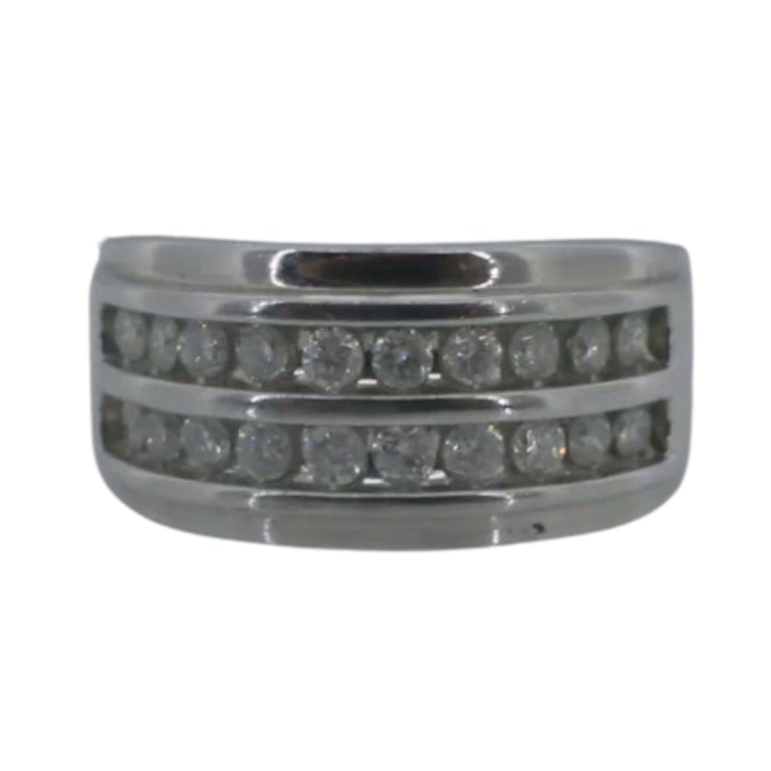 Stack of silver rings with embedded stones on a white background