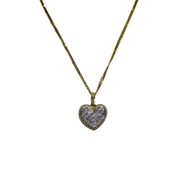 Heart-shaped diamond pendant on a gold chain against a white background
