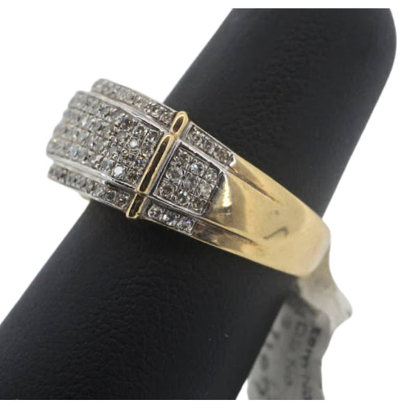 Gold and silver ring on a black stand with a white background